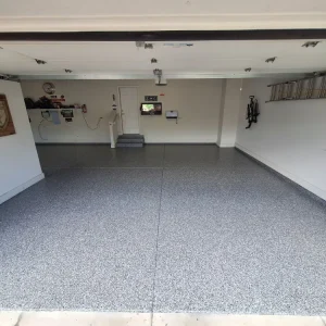 Garage floor with Outer Space flake color from Galaxy Concrete.